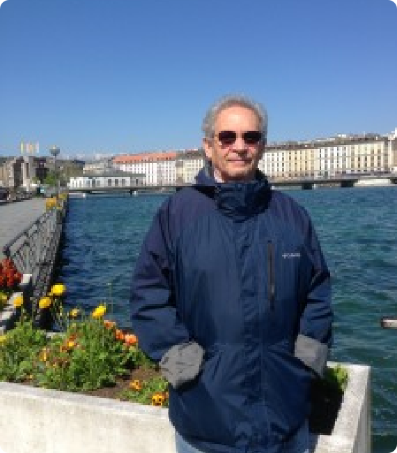 Barry L. Becker wearing a blue jacket and sunglasses